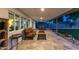 Covered patio with comfortable seating, perfect for outdoor dining and relaxation with views of the landscaped yard at 3027 W Wescott Dr, Phoenix, AZ 85027