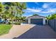 Backyard view showcasing pool, seating area, storage shed, landscaping, and neutral-toned gravel for low maintenance at 3027 W Wescott Dr, Phoenix, AZ 85027