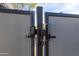 Close-up of the home's secure gate featuring a coded entry for enhanced privacy and safety at 3027 W Wescott Dr, Phoenix, AZ 85027