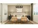 Serene main bedroom with neutral tones, decorative lighting, and stylish furniture for a peaceful retreat at 3238 E Outlaw Ln, San Tan Valley, AZ 85140