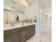 Modern bathroom with double vanity, sleek countertops, and stylish fixtures for a spa-like experience at 3272 E Ranchhand Dr, San Tan Valley, AZ 85140