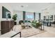 Stylishly furnished living room with modern decor, a comfortable seating area, and ample natural light at 3272 E Ranchhand Dr, San Tan Valley, AZ 85140