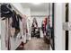 Spacious walk-in closet featuring ample hanging space and shelving, keeping belongings organized at 3432 E Bartlett Dr, Gilbert, AZ 85234