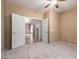 Bedroom with neutral carpeting and a double door entrance at 346 W Oxford Ln, Gilbert, AZ 85233