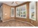 Bright dining area featuring tile floors, plantation shutters and neutral color palette at 346 W Oxford Ln, Gilbert, AZ 85233