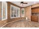 Inviting dining area with plantation shutters, tile floors, and direct access to kitchen at 346 W Oxford Ln, Gilbert, AZ 85233