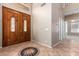 Grand entrance featuring a double door entry and tile flooring with a decorative medallion at 346 W Oxford Ln, Gilbert, AZ 85233