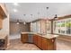 Modern kitchen featuring stainless steel appliances and an open design, seamlessly connecting to the living area at 346 W Oxford Ln, Gilbert, AZ 85233