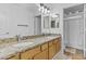 Bathroom featuring double sinks, granite counters, and a shower at 3478 E Park Ave, Gilbert, AZ 85234