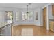 Dining area with bay window, decorative lighting and view to pool at 3478 E Park Ave, Gilbert, AZ 85234