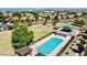 Gorgeous aerial view of community featuring a large swimming pool, picnic pavilions, green spaces and scenic views at 3649 E Hutchins Ct, Gilbert, AZ 85295
