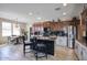 Beautiful kitchen with an island, stainless steel appliances, and a casual dining area at 3649 E Hutchins Ct, Gilbert, AZ 85295