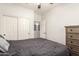 Bedroom featuring soft bedding, carpet, and an open doorway at 3810 S Star Canyon Dr, Gilbert, AZ 85297