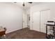 Neutral bedroom featuring closet space, carpet flooring, and an open doorway at 3810 S Star Canyon Dr, Gilbert, AZ 85297