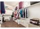 Spacious walk-in closet featuring shelving, hanging rods, and organized storage solutions at 3810 S Star Canyon Dr, Gilbert, AZ 85297
