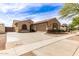 Well-maintained single-Gathering home features a spacious driveway and attached two-car garage at 3810 S Star Canyon Dr, Gilbert, AZ 85297