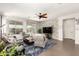 Spacious living room with comfortable seating and a view of the outdoor pool area at 3810 S Star Canyon Dr, Gilbert, AZ 85297