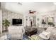 Large and open living area featuring neutral tones, tile flooring, and stylish decor at 3810 S Star Canyon Dr, Gilbert, AZ 85297