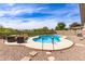 Refreshing backyard pool with ample seating, perfect for outdoor entertaining at 3810 S Star Canyon Dr, Gilbert, AZ 85297