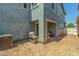 Backyard with a covered patio area and a well-maintained yard space at 3850 E Robert St, Gilbert, AZ 85295