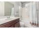 Bathroom featuring a single sink vanity, shower, and toilet at 3850 E Robert St, Gilbert, AZ 85295