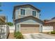 Home with two car garage, neutral paint scheme and roof at 3850 E Robert St, Gilbert, AZ 85295