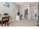 Office with glass top desk, chair, and walk-in closet at 3850 E Robert St, Gilbert, AZ 85295