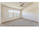 Serene bedroom with vaulted ceilings, a large window for natural light, and plush carpeting at 3930 W Monterey St # 136, Chandler, AZ 85226