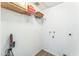 Laundry room with cabinet storage, laminate flooring, and hookups ready for appliances at 3930 W Monterey St # 136, Chandler, AZ 85226