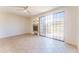 Living room with a fireplace and sliding glass doors to the patio at 3930 W Monterey St # 136, Chandler, AZ 85226