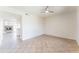 Bright living room featuring tile flooring and a modern ceiling fan at 3930 W Monterey St # 136, Chandler, AZ 85226