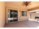 Relaxing covered back patio with view of pool and outdoor kitchen area at 3935 E Graphite Rd, San Tan Valley, AZ 85143