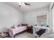 Comfortable bedroom space with desk, chair, twin bed, and neutral walls at 3935 E Graphite Rd, San Tan Valley, AZ 85143