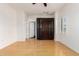 Bright bedroom with wood floors, a built-in wardrobe, and lots of natural light at 3935 E Rough Rider Rd # 1183, Phoenix, AZ 85050
