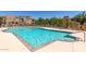 Sparkling community pool with lounge chairs for residents to relax at 3935 E Rough Rider Rd # 1183, Phoenix, AZ 85050