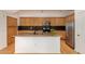 Modern kitchen with granite countertops, stainless steel appliances, and a center island at 3935 E Rough Rider Rd # 1183, Phoenix, AZ 85050
