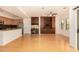 Bright living area with a modern kitchen, media center, and access to a patio at 3935 E Rough Rider Rd # 1183, Phoenix, AZ 85050