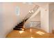 Elegant staircase with dark brown steps, metal railing, and lots of light from above at 3935 E Rough Rider Rd # 1183, Phoenix, AZ 85050