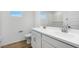 Bathroom featuring a double sink vanity, white tile, and a large mirror at 4064 E Ghost Flower Ln, San Tan Valley, AZ 85140