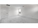 Bedroom features carpet flooring, modern lighting, and a large window at 4064 E Ghost Flower Ln, San Tan Valley, AZ 85140