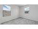 Bright bedroom with two windows providing ample natural light at 4064 E Ghost Flower Ln, San Tan Valley, AZ 85140