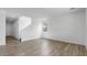Open-concept living room features wood-look tile floors and lots of natural light at 4064 E Ghost Flower Ln, San Tan Valley, AZ 85140