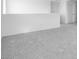 Large open loft area with neutral carpeting and adjacent storage space at 4064 E Ghost Flower Ln, San Tan Valley, AZ 85140