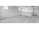 Open loft space with neutral carpeting, ample natural light, and modern design at 4064 E Ghost Flower Ln, San Tan Valley, AZ 85140