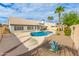Inviting backyard pool area, complemented by desert landscape and the home's neutral-colored exterior at 4214 E Morrow Dr, Phoenix, AZ 85050