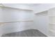 Walk-in closet with built in shelving and ample space for storage at 4214 E Morrow Dr, Phoenix, AZ 85050