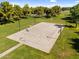 Aerial view of a well-maintained outdoor basketball court surrounded by green space, promoting an active lifestyle within the community at 4355 E Cullumber St, Gilbert, AZ 85234