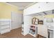 Adorable bedroom with lofted bed, study area, cloud decor, and built in shelves at 4355 E Cullumber St, Gilbert, AZ 85234