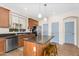 Open kitchen design with granite countertops, stainless steel appliances, and a kitchen island at 4355 E Cullumber St, Gilbert, AZ 85234