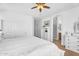 Spacious main bedroom features a closet, access to bathroom, and white furniture at 4355 E Cullumber St, Gilbert, AZ 85234